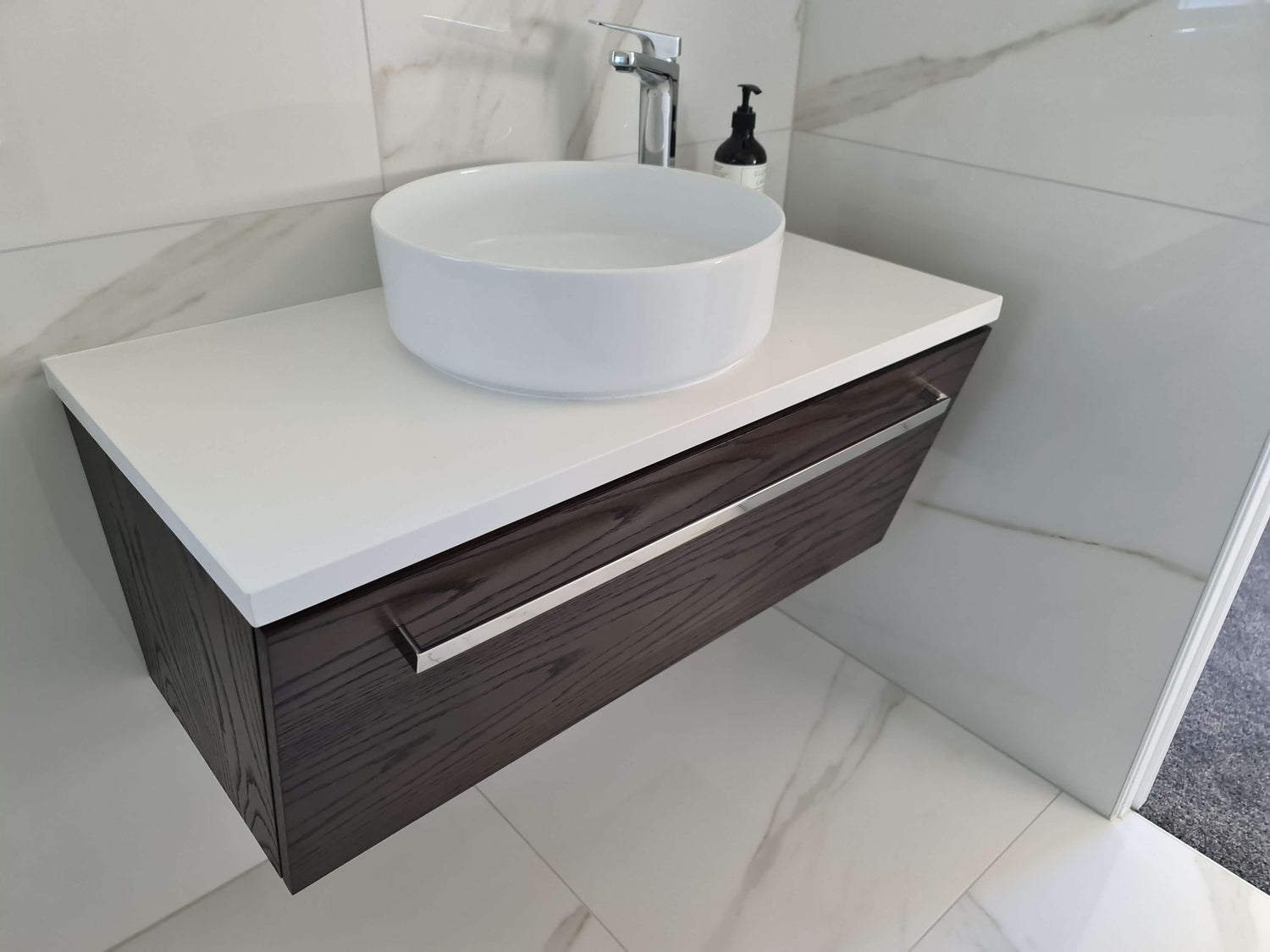 Custom made vanity by STiRLiNG KiTCHENS for one of their prominent resellers